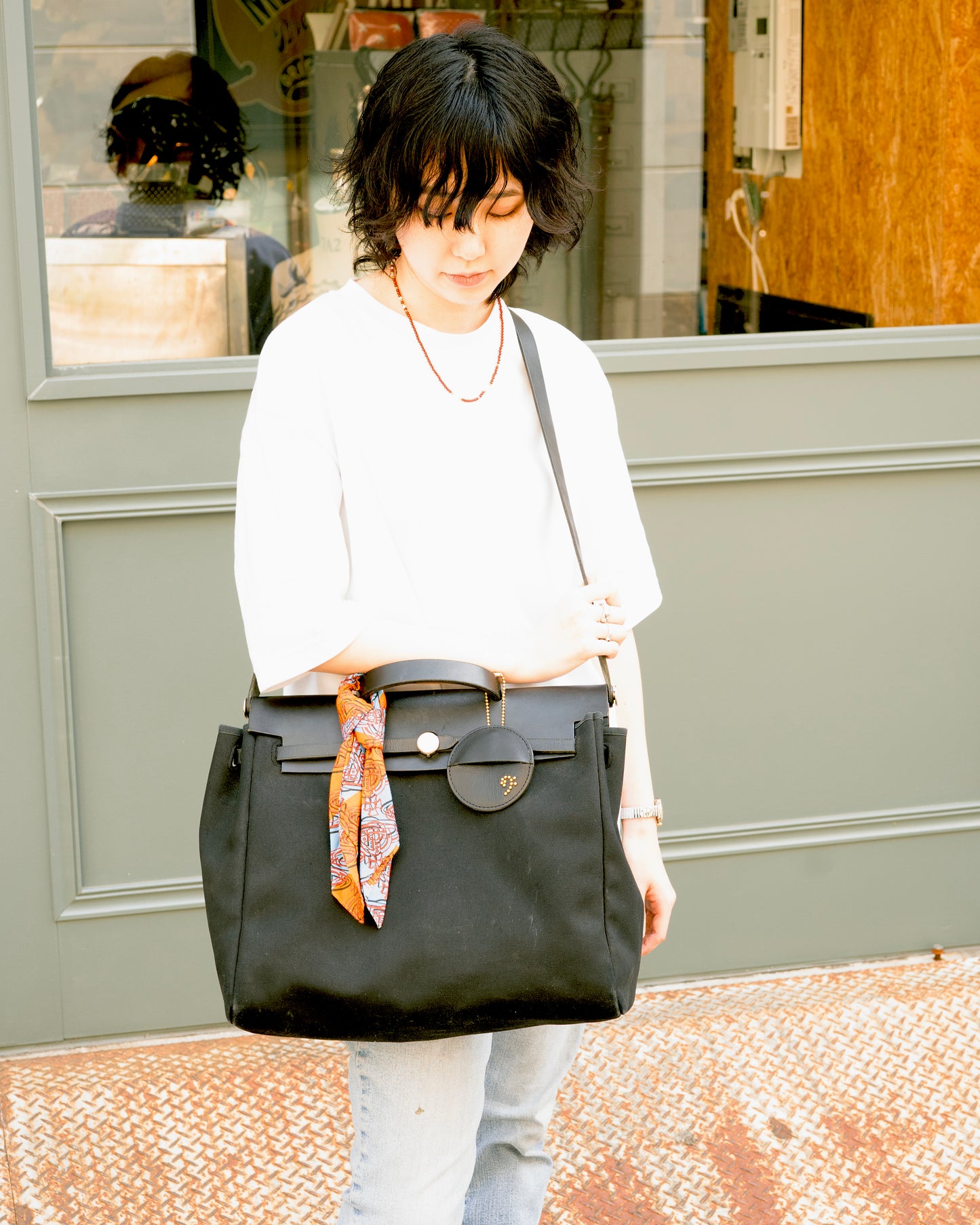 着用｜Mamiko Oda（小田満美子）× Judy On The Roof. MAMIKO ODA LEATHER MULTI CASE｜BLACK｜Oda Judy Shop 4